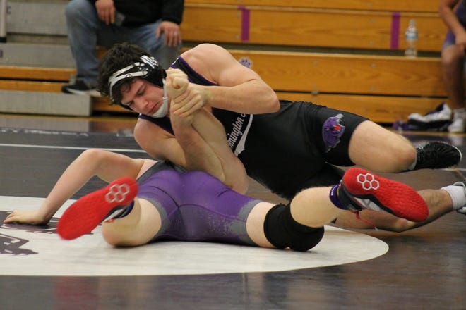 Bloomington South's 182-pounder Jackson Lynch works against a foe from Seymour at the South Invitational. He's off to a 15-4 start with 12 pins.