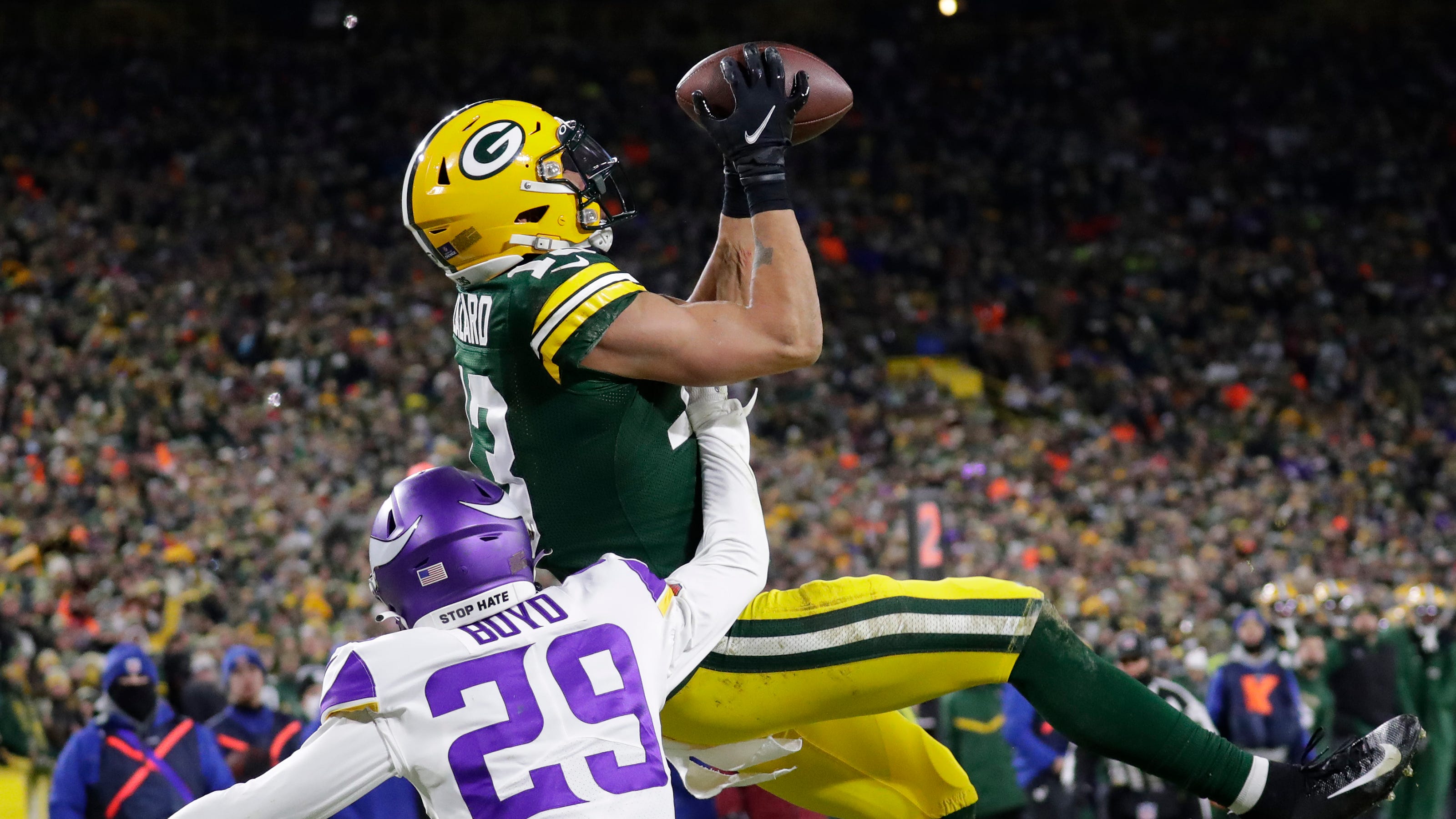 Green Bay Packers wide receiver Allen Lazard (13) pulls down a touchdown reception against Minnesota Vikings defensive back Kris Boyd (29) in the second quarter during their football game Sunday, January 2, 2022, at Lambeau Field in Green Bay, Wis. Dan Powers/USA TODAY NETWORK