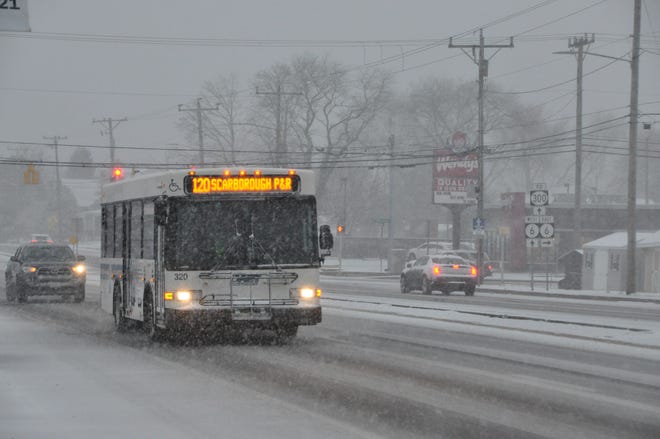 A DART bus travels south on Route 13 in Smyrna near East Commerce Street (Route 6) and Wendy's restaurant at about 8:10 a.m. on Monday, Jan. 3, 2022.