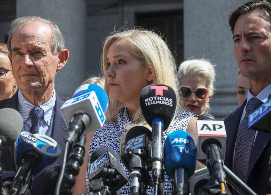 Virginia Roberts Giuffre with her lawyer David Boies in New York, Aug. 27, 2019.