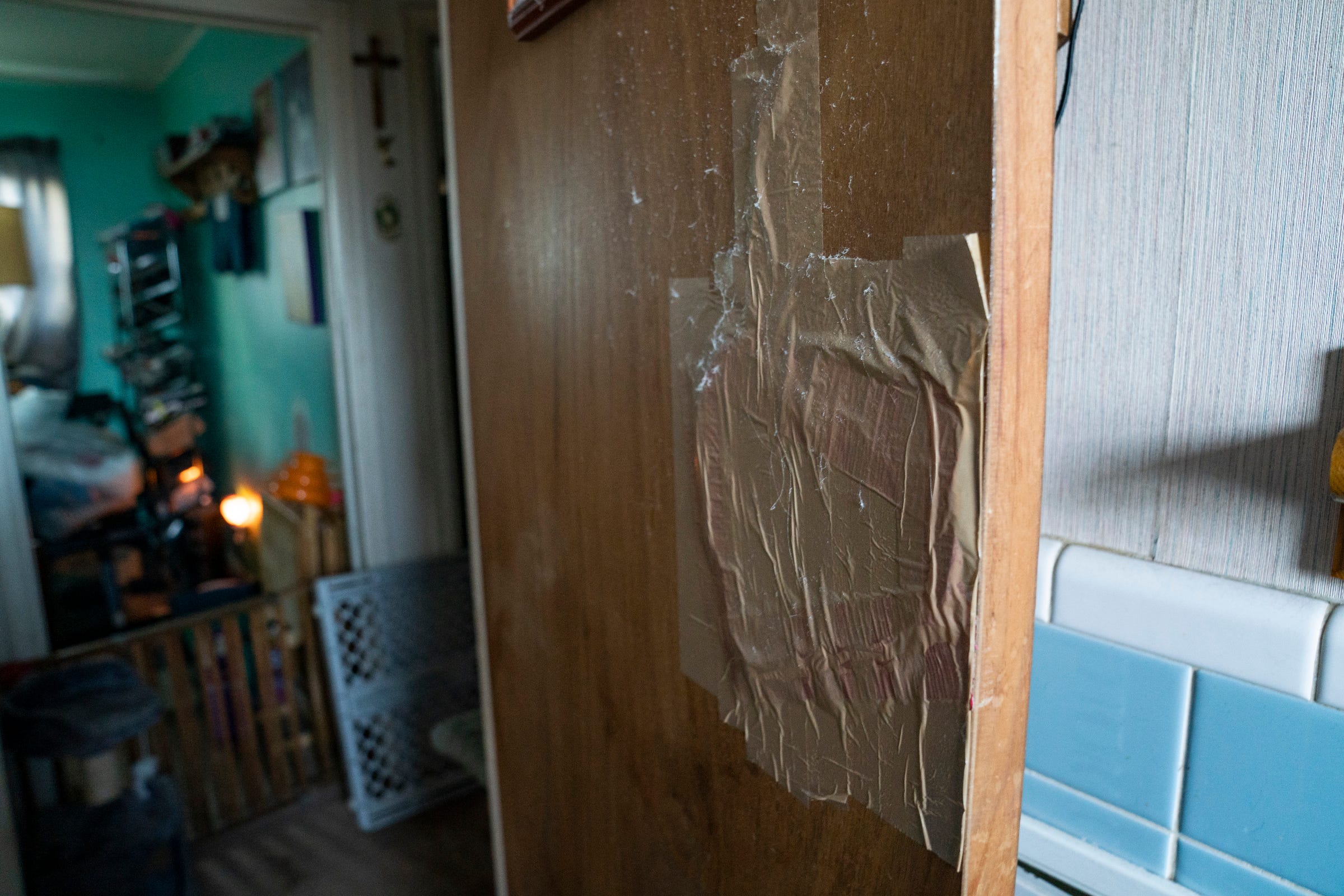 This broken door in Kathi Kuykendall's Allen Park home is a sign of Asa Kuykendall's struggle with drugs and Kathi's struggle with Asa.