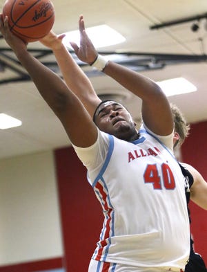 Alliance's Stephen Gales puts up a shot against Carrollton during conference action at Alliance High School Tuesday, January 4, 2022.