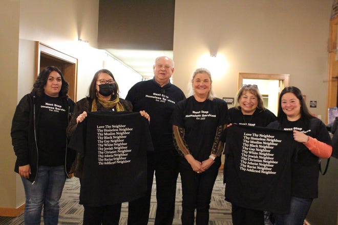 Assistant Director Sara Gray and board members Jo Carson, Tim Smith, Kim Wohlford, Susan Tucker and Amy Sights of Next Step Homeless Services stand outside the city board of directors meeting Jan. 4.