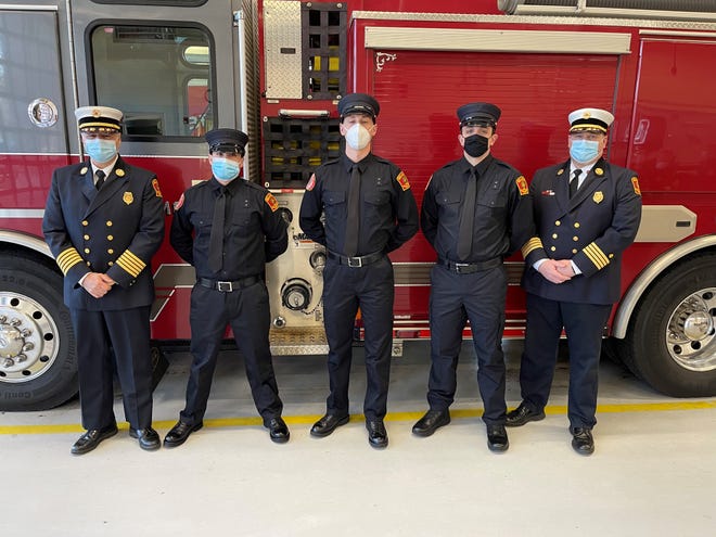 Town Clerk Ellen O’Brien Cushman administered the Oath of Office to three recruit firefighters beginning their training at the Belmont Fire Department.