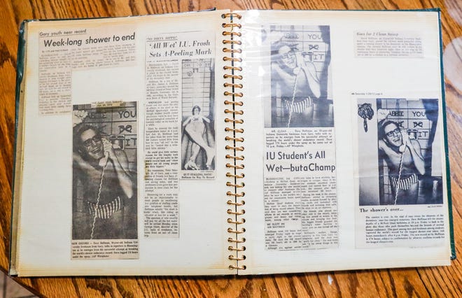 A scrap belonging to IU grad Dave Hoffman features articles and photos of his attempt to break the Guinness world record for the longest shower on Wednesday, Jan. 5, 2022, at his Indianapolis home. Hoffman succeeded in setting the Guinness world record for longest shower ever taken, 174 hours, on Jan. 27, 1972, in his dorm at IU.