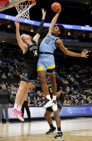 Marquette forward Justin Lewis has emerged as a candidate for the Big East player of the year.