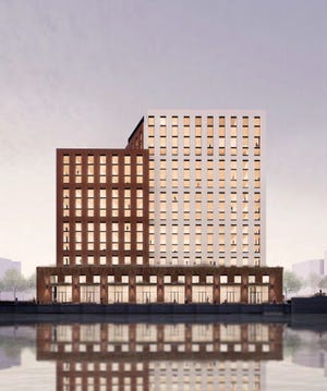 The Edison, a 15-story apartment building, is to open on downtown Milwaukee's riverfront by late summer 2023.
