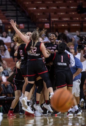 Texas Tech cheers after winning the game against Texas at the Frank Erwin Center on Wednesday, Jan. 5, 2022. Texas Tech defeated The Longhorns 74-61.