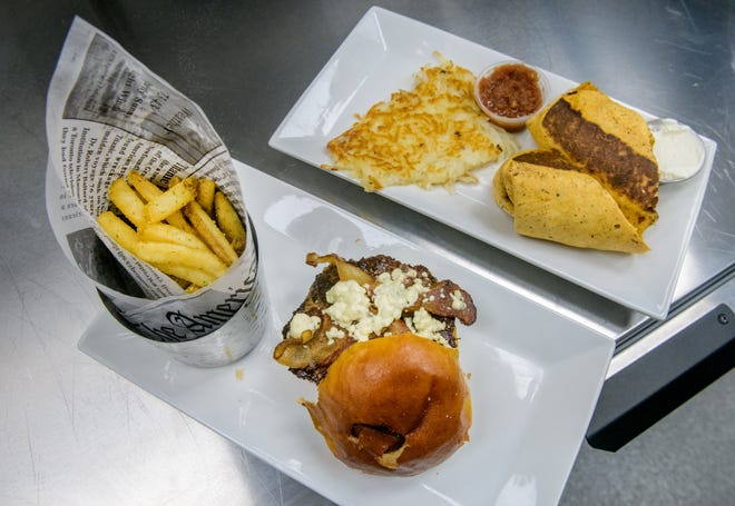 A breakfast burriton with hash browns wait to be delivered to diners at the new Childers Eatery, 815 Camp St. in East Peoria.