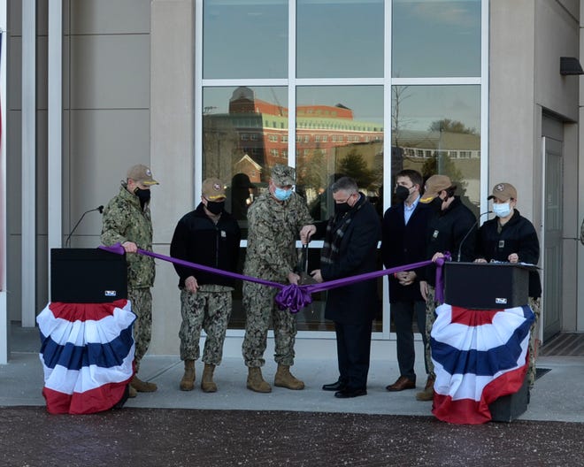 Portsmouth Naval Shipyard hosted a ribbon cutting ceremony for the new Naval Branch Health Clinic Portsmouth on Thursday, Jan. 6. Shown cutting the ribbon (left to right) are Acting PNS Commander, Capt. Samuel Cordero; Commanding Officer, Naval Health Clinic New England, Capt. Gordon Blighton; Surgeon General for the U.S. Navy, Rear Adm. Bruce Gillingham; Chief of Staff, DHA Small Market & Stand-Alone Military Medical Treatment Facility Organization, Mr. Eric Stringer; U.S. Congressman Chris Pappas; Officer in Charge, NBHC Portsmouth, Capt. Leah Soley; and Master of Ceremonies, Lt. Kristina Yepez.