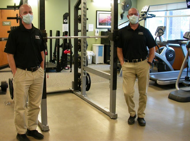 UPMC Somerset Rehabilitation and Wellness Center exercise physiologists Mike Seibert (left) and Dave Polcha are ready to help individuals get healthy in the new year.