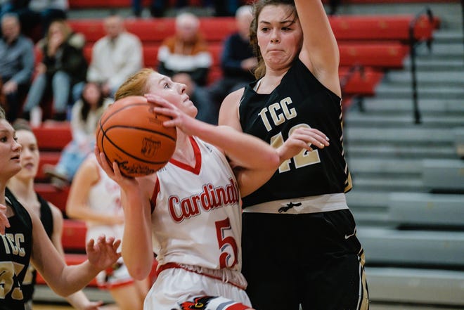 Sandy Valley's Lexi Tucci drives to the basket as TCC's Cassidy Green attempts a block Wednesday night.