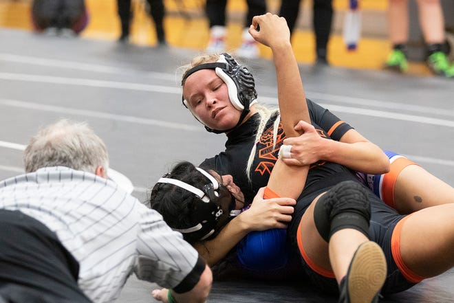 Savanna Johnson has left her mark on Waverly as a two-time OHSWCA state placer and the first girl to play on the school's football team.