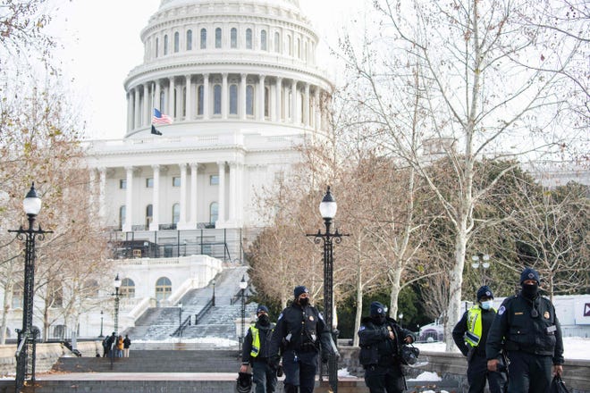 Capitol Police patrol outside the US Capitol in Washington, DC, Jan. 6, 2022, on the first anniversary of the attack on the US Capitol by supporters of then President Donald Trump.