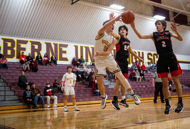 Berne Union's Nate Nemeth (12) passes the ball past the Rosecrans defense as Berne Union hosted Rosecrans in boys basketball action at Berne Union High School in Sugar Grove, Ohio on January 5, 2022.