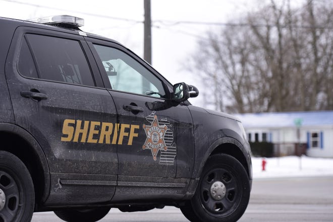 A sheriff vehicle blocks traffic on M-25 in Burtchville Township following a crash Thursday morning.