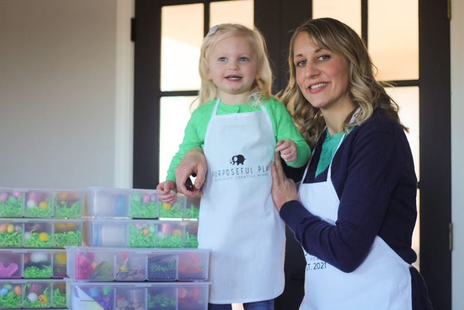 Founder of Purposeful Play and mom of five Jaclyn Morse with her three-year-old daughter, Adelyn.