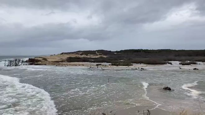 Cape Cod Bay water washes inland at Duck Harbor in Wellfleet.