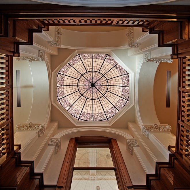 The new stained glass dome inside the old Lenawee County Courthouse is seen from the first floor rotunda up through the now open second floor.