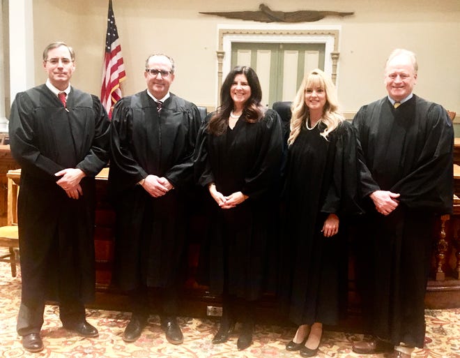 Honesdale's own Matt Meagher was sworn in last week as the new Judge in Wayne County's Court of Common Pleas. Pictured here at the investiture ceremony are (from left): President Judge Jason Legg (Susquehanna County), Judge Matt Meagher, President Judge Janine Edwards (Wayne County), Judge Kelly Gaughan (Pike County) and President Judge Greg Chelak (Pike County).