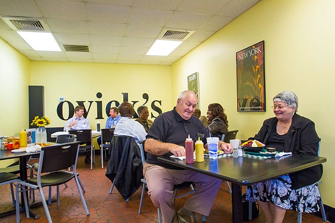 Patrons enjoy a meal at Lovick's Cafe. Steve Lovick, owner, said his labor shortage problems have not gotten better yet.