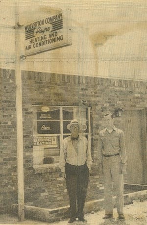 H.W. Wolverton and his son Thomas in front of their Duncanville office in the 1960s