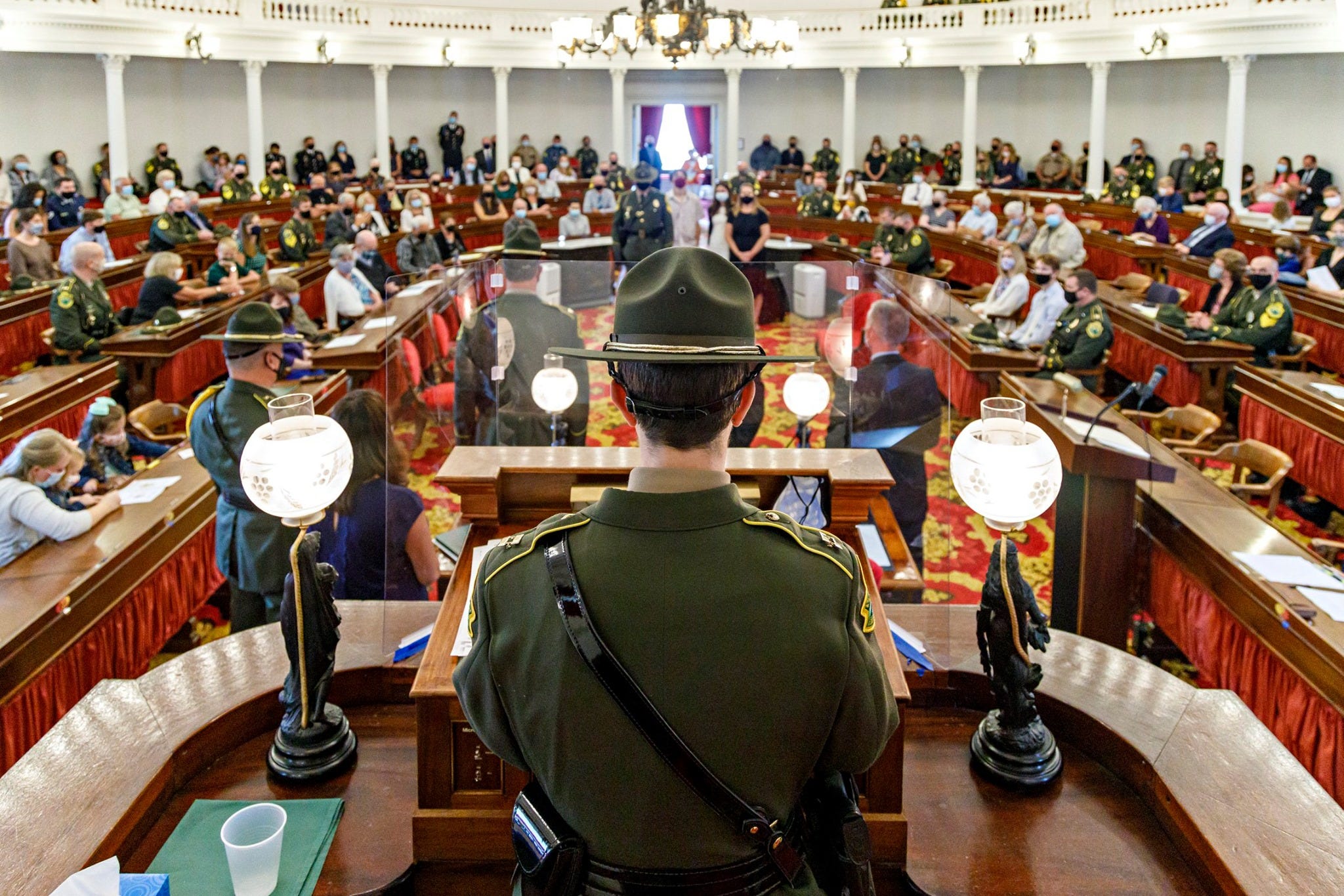 All eyes on her: Captain Julie Scribner stands at the podium officiating as emcee of the 2021 Vermont State Police Awards at the Vermont Statehouse on Sep. 17 just one week before her retirement, which was also her last time appearing in uniform. She emceed the event at least 12 times over the years and said it was one of her favorite additional duties.