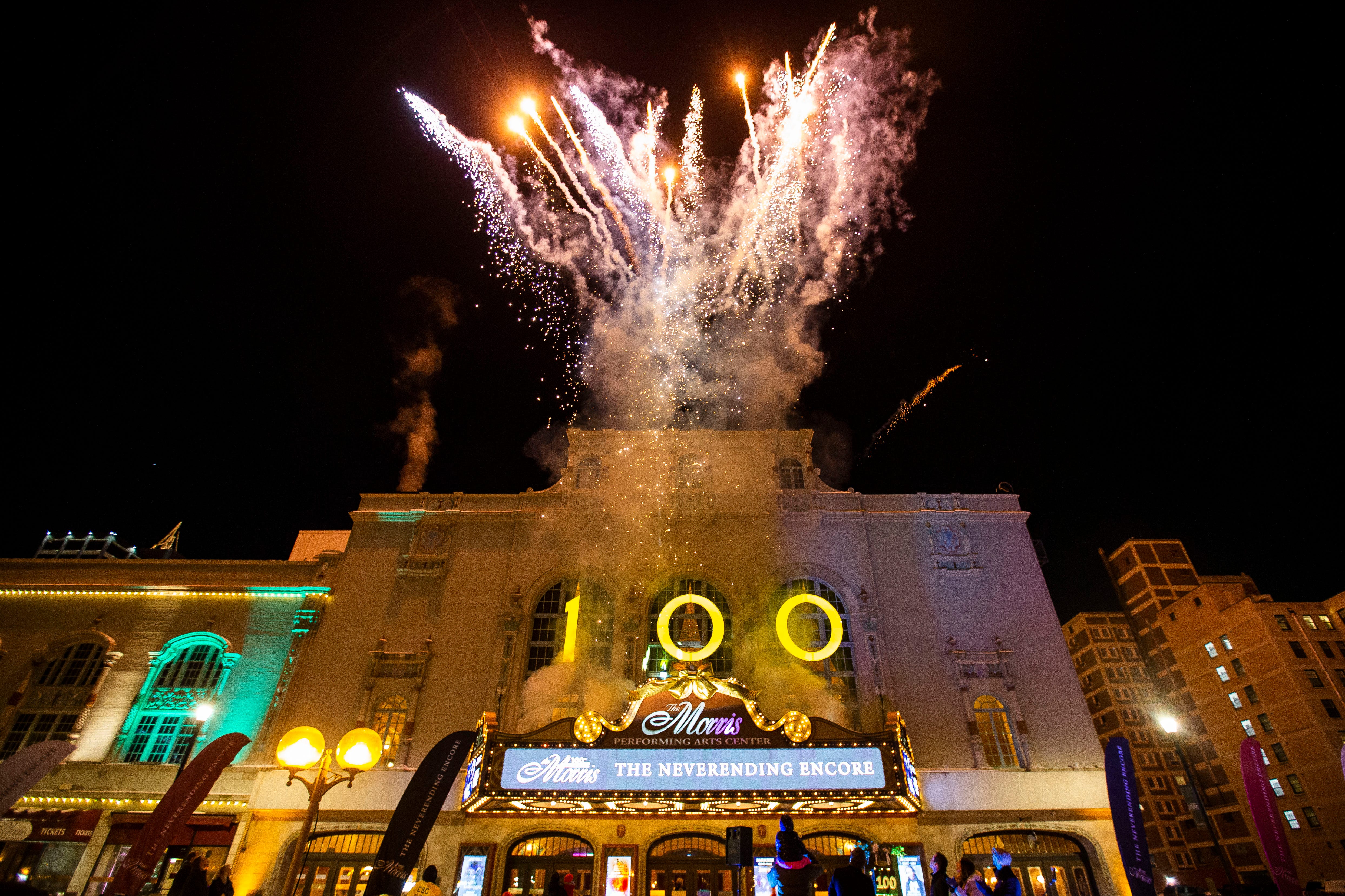 Fireworks are launched to celebrate the 100th anniversary of The Morris Performing Arts Center Friday, Jan. 7, 2021 in South Bend.