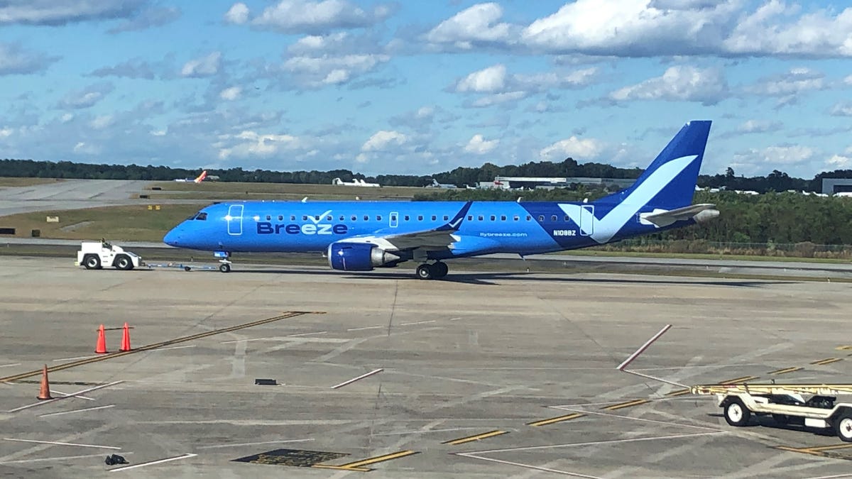 A Breeze Airways Embraer jet at Charleston International Airport in South Carolina. The budget airline began service in 2021.