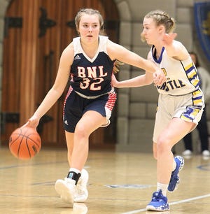 BNL sophomore guard Madisyn Bailey brings the ball up against Castle's Keira Moore during a 47-43 road win Saturday.