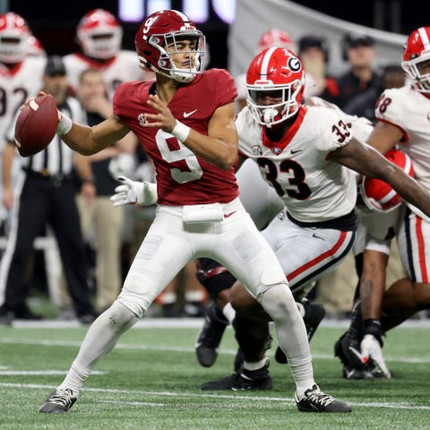 Alabama Crimson Tide quarterback Bryce Young attem