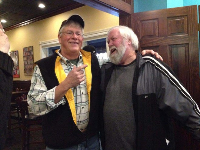 Jerry Pond (right) at his retirement party in 2015 from the Cheboygan Daily Tribune with former Tribune publisher Gary Lamberg (left).