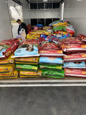 A trailer holds the 7,000 pounds of pet supplies donated for the Humane Society of Branch County.