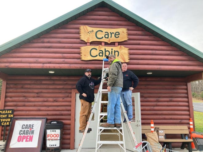 Growing Lackawaxen has thanked Jason Manookian of Rory's Rustic Creations, LLC for making The new sign for the Care Cabin. Jay Knapp, Mark Smith and Sebastian Lata also were thanked for installing the sign, in December. This image is from the Facebook post of the nonprofit Growing Lackawaxen organization.