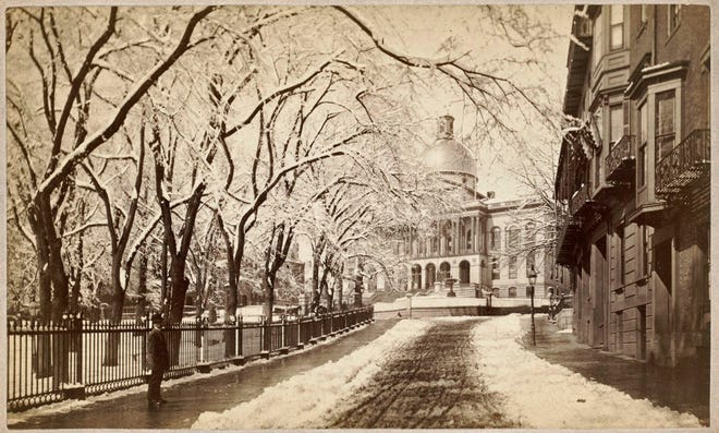 Here is what the State House looked like from Park Street in January 1893. Learn more from Digital Commonwealth at www.digitalcommonwealth.org.