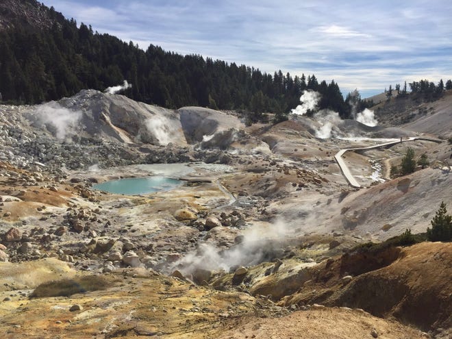 Bumpass Hell with Frying Pan Spring in foreground Lassen Volcanic national park.