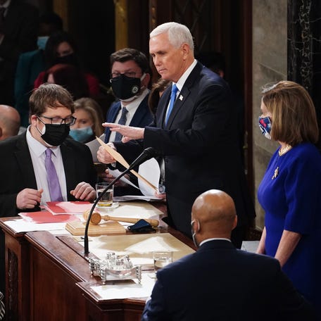 Vice President Mike Pence and House Speaker Nancy Pelosi preside over the certification of Electoral College votes at the Capitol on Jan. 6, 2021.