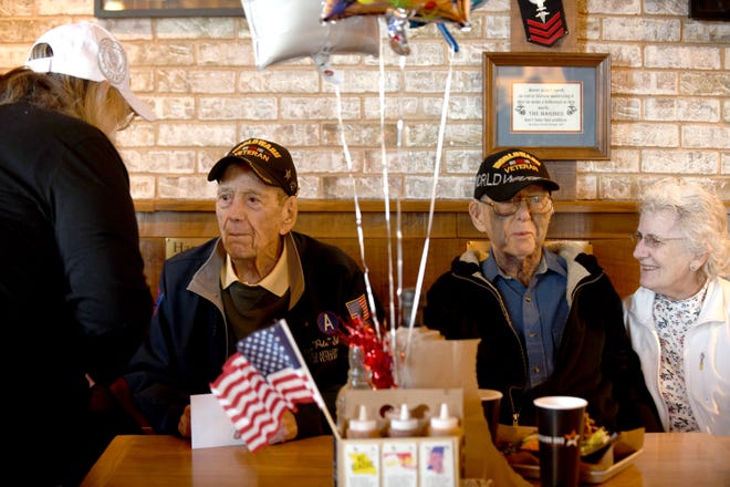 Mission BBQ restaurant helped World War II veterans Harry "Pete" Shaw (Army) and Ralph Dunnerstick (Marines) celebrate their birthdays at the restaurant Tuesday.