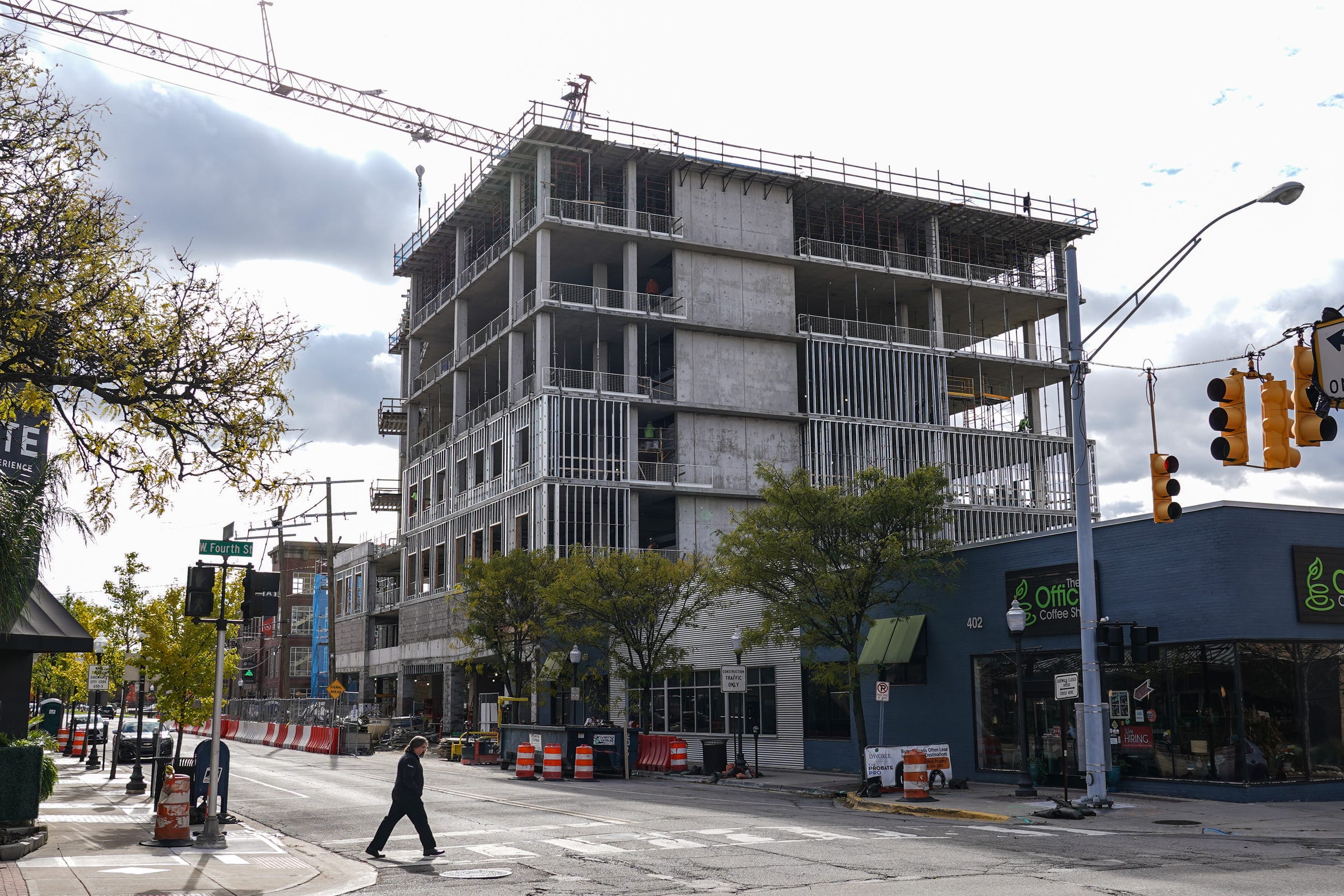 Construction crews work on a new Baker College building along South Lafayette Avenue in downtown Royal Oak in November.