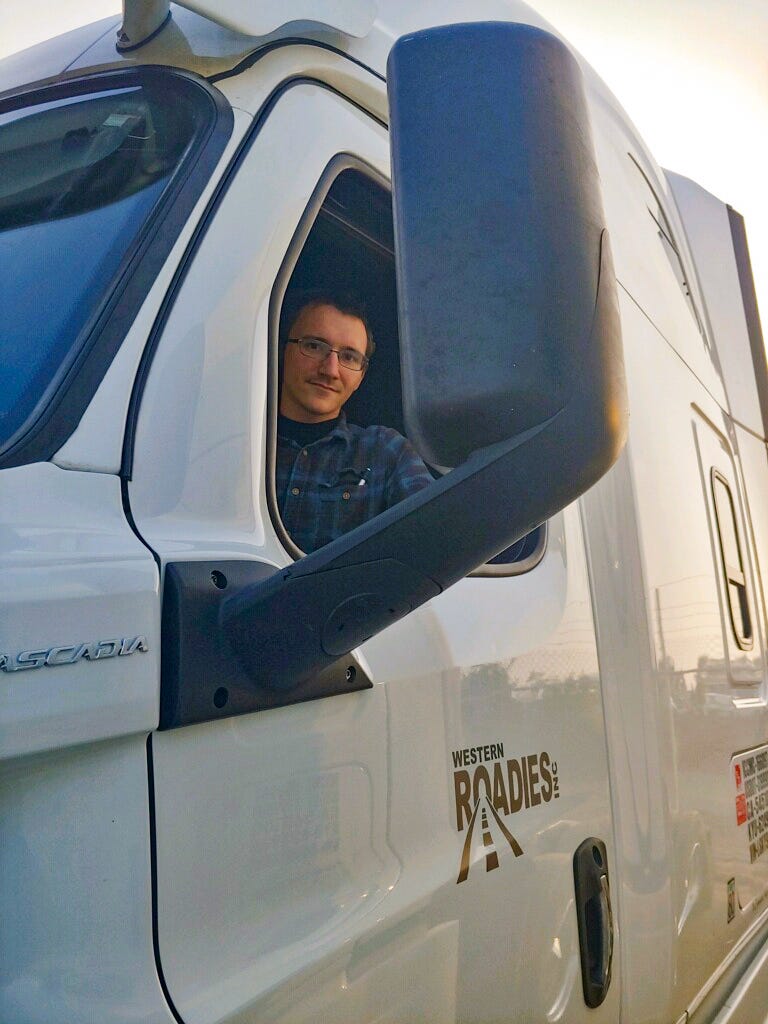 Daniel Church poses for a photo in his truck.