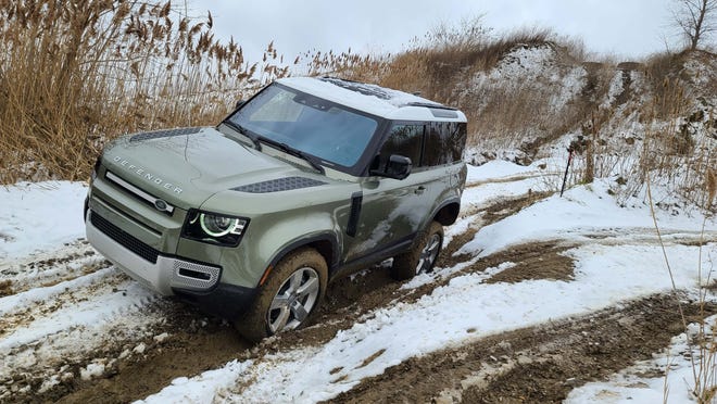 The 2021 Land Rover Defender 90 is comfortable on and off-road, though its electronics keep a tight rein on the Bond SUV's abilities.