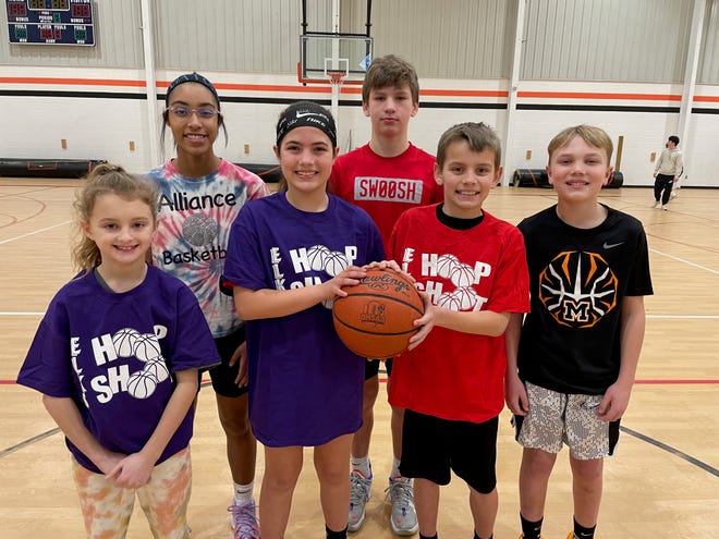 Winners of the Alliance elks 467 Hoop Shoot held at the Moulin Center were, from left, (front), Kayla Tucker, 8-9 girls; Shelby Odey, 10-11 girls; Parker Jones, 8-9 boys, Brady Riggs, 10-11 boys; (back), Gianna Phillips, 11-12 girls, and Brody Fast, 12-13 boys. The winners will compete in the districts at Ravenna High School Saturday, January 15.