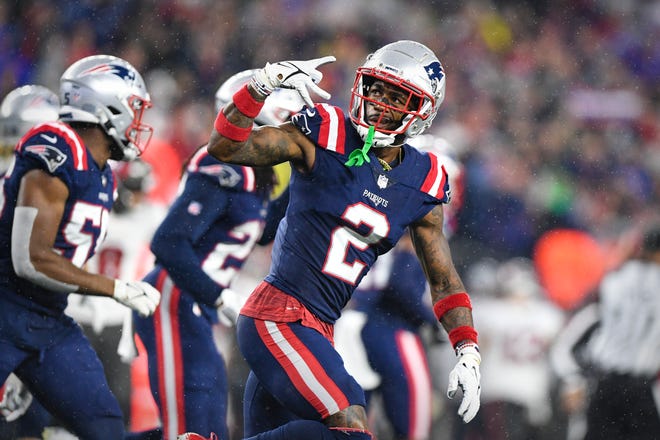 Patriots cornerback Jalen Mills (2) celebrates a defensive stop of the Tampa Bay Buccaneers during the game on Oct. 3 at Gillette Stadium.