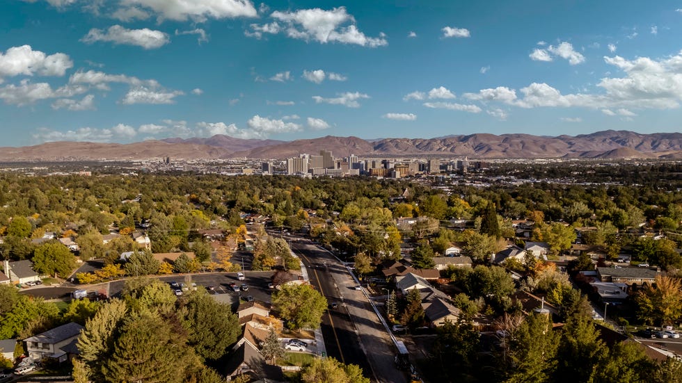 A canopy of trees covers neighborhoods to the northwest of downtown Reno.