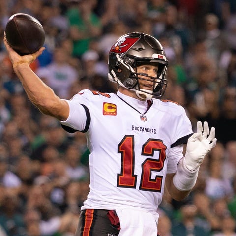 Tampa Bay Buccaneers quarterback Tom Brady (12) pa