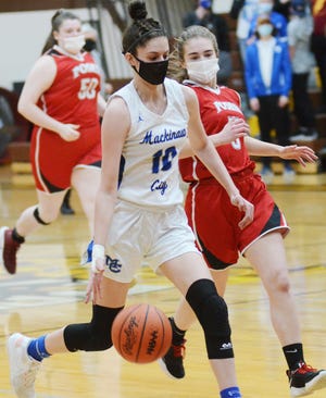 Madison Smith (10) and the Mackinaw City girls stayed unbeaten with a 79-25 victory at Alba on Wednesday.