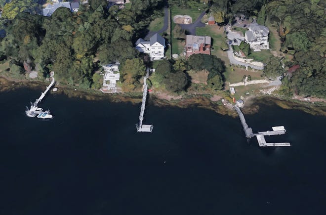 The Berkley home with the extended dock in the middle of this satellite image, on Assonet River, sold for $910,000 on Dec. 29. The four-bedroom, three-bath home offers 2,400 square feet of living space and a custom-built floating dock.