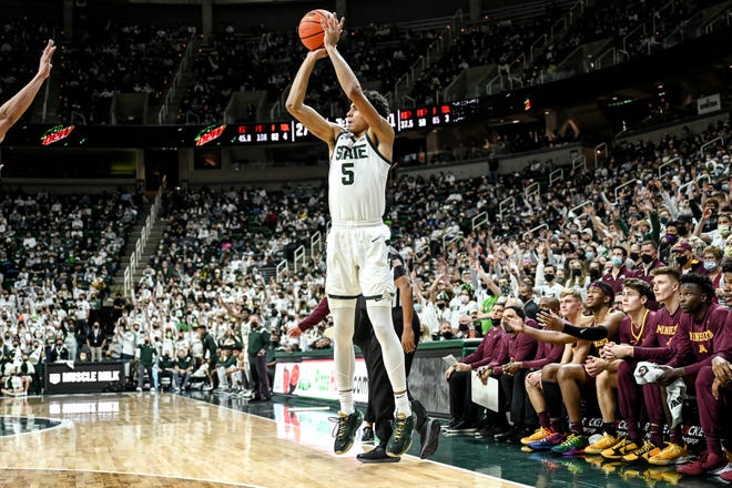 Michigan State's Max Christie scores 3 against Minnesota during the first half on Wednesday, Jan. 12, 2022, at Priceline Center in East Lansing.