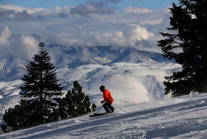 A skier makes his way down a run on Mt. Rose Ski Tahoe in December 2021.