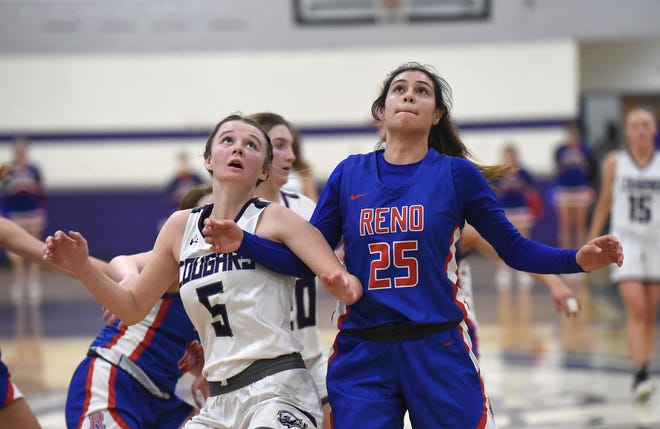 Spanish Springs' Layni Noonkester tangles with Reno's Adia Walker for a rebound in the teams' game last month.